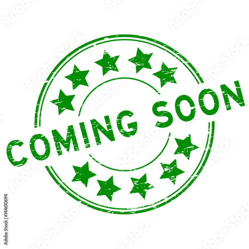Grunge green coming soon with star icon round rubber stamp on white background