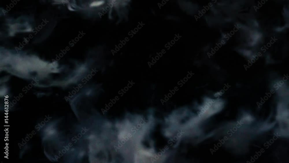 Slow motion video of the flakes of down flying inside the selecting machine, selective focus Slow motion video of the flakes of down flying inside the selecting machine, selective focus