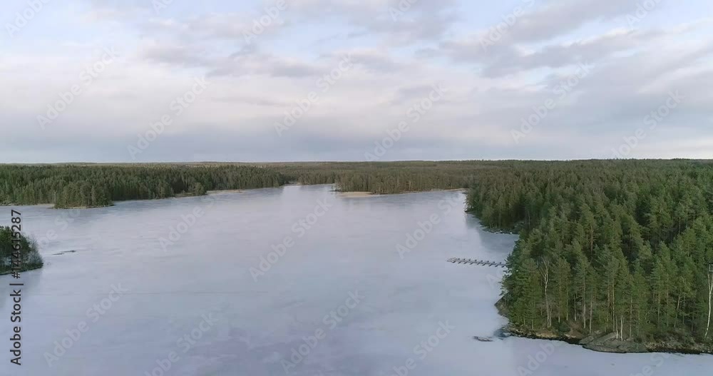 Matildanjarvi, Cinema 4k aerial of flying above icy matildanjärvi lake, in matildanlaakso, at teijon kansallispuisto, on a sunny spring evening, in, Salo, Finland Matildanjarvi, Cinema 4k aerial of flying above icy matildanjärvi lake, in matildanlaakso, at teijon kansallispuisto, on a sunny spring evening, in, Salo, Finland