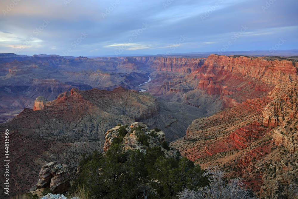 Grand Canyon at the sunset with colorful cliffs, Colorado river