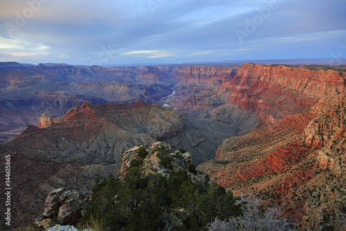 Grand Canyon at the sunset with colorful cliffs, Colorado river