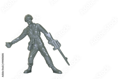 Miniature toy soldier on white background with clipping path.
