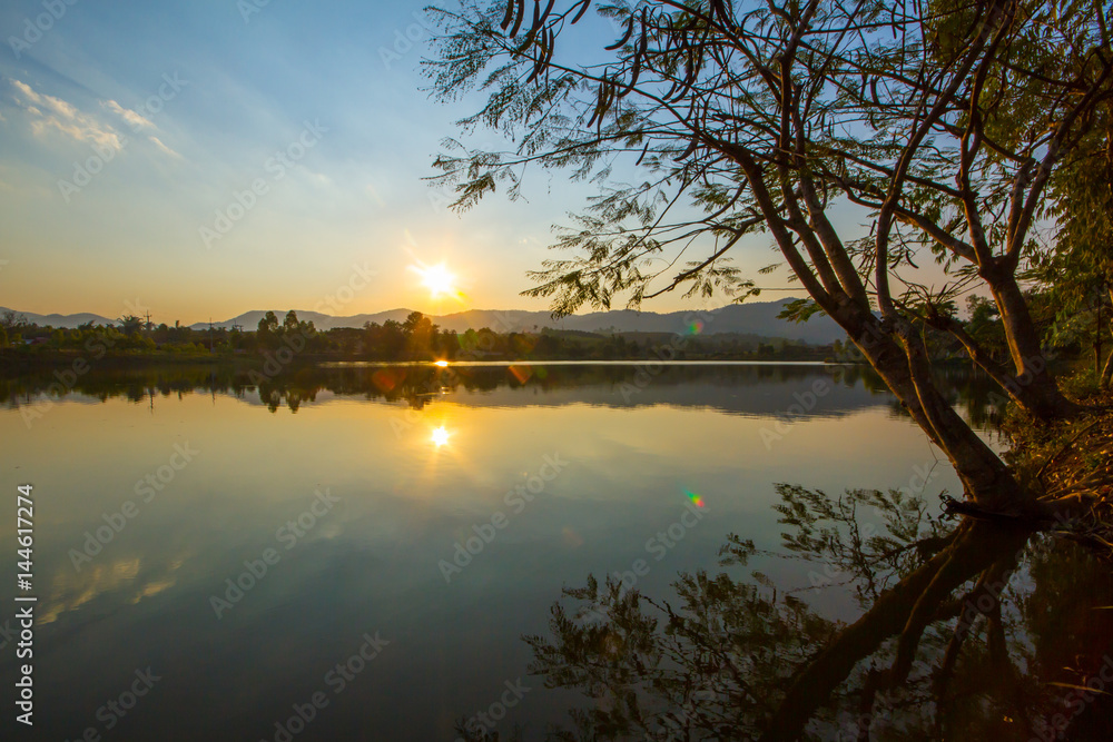 Sunset in the lake of countryside Northern Thailand
