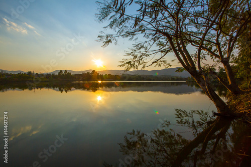 Sunset in the lake of countryside Northern Thailand