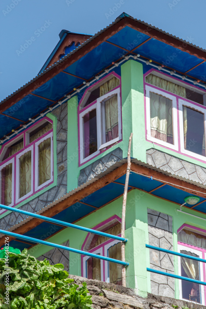 One of the colourful guesthouses built to accomodate the large number of hikers that come to walk along the many trails in the Annapurna region, Nepal.