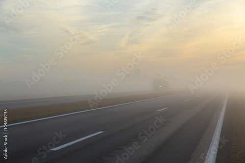 Freeway and a car in fog