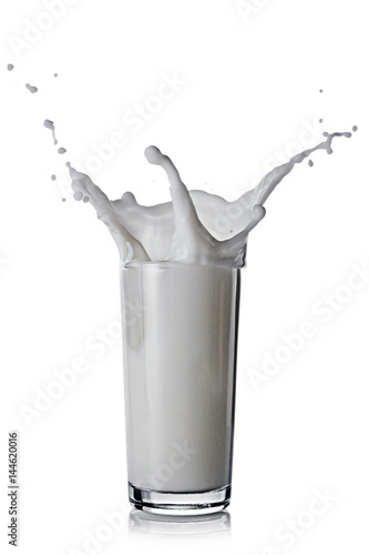 Splash in glass of white milk