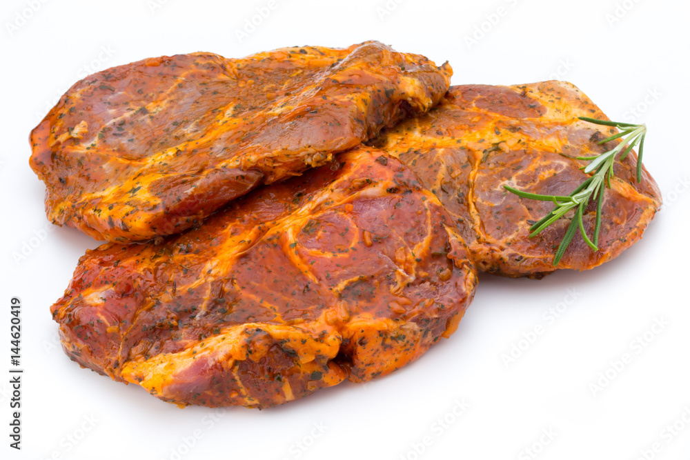 Pork chop, marinated. Isolated on the white background. Pork chop, marinated. Isolated on the white background.