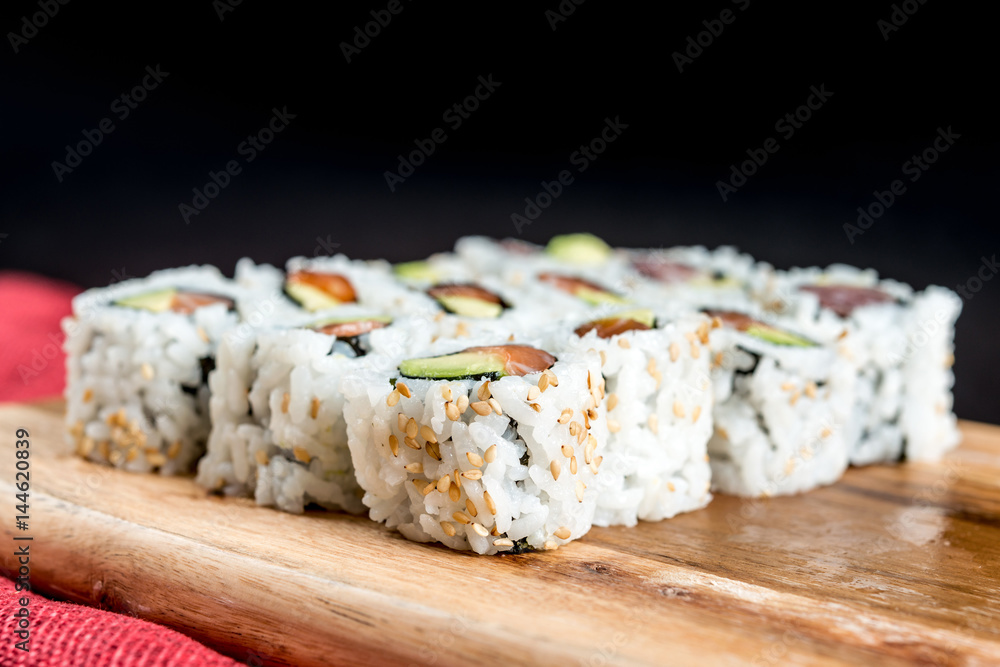 Japanese food Sushi Roll Maki of Salmon and avocado Japanese food Sushi Roll Maki of Salmon and avocado
