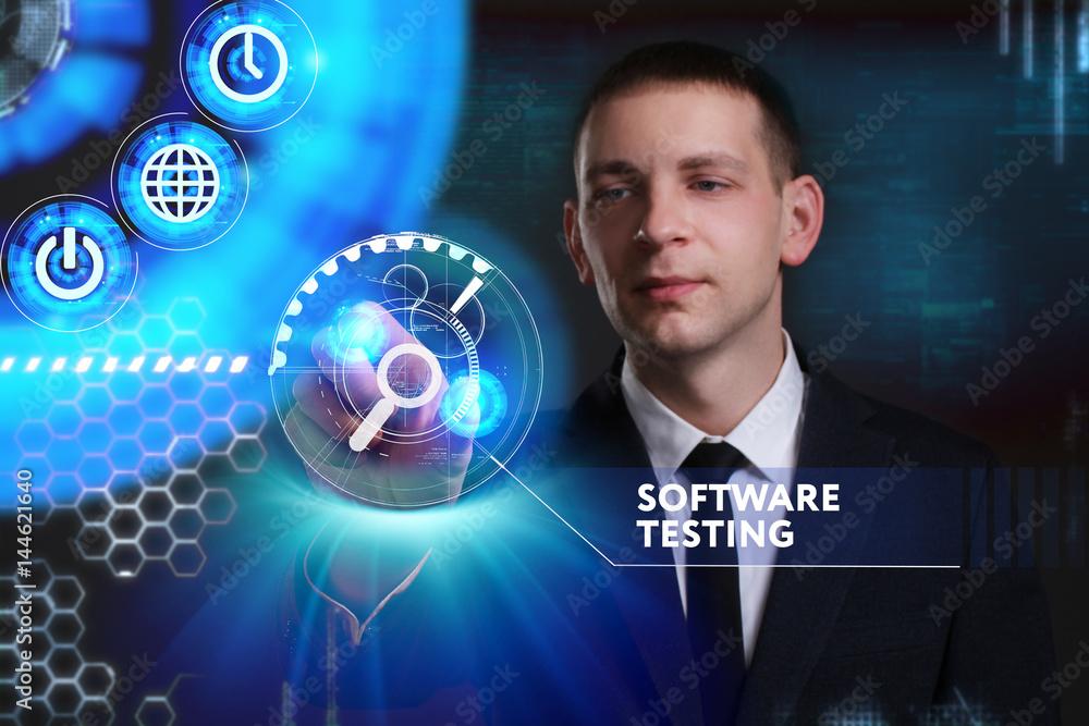 Business, Technology, Internet and network concept. Young businessman working on a virtual screen of the future and sees the inscription: Software testing Business, Technology, Internet and network concept. Young businessman working on a virtual screen of the future and sees the inscription: Software testing