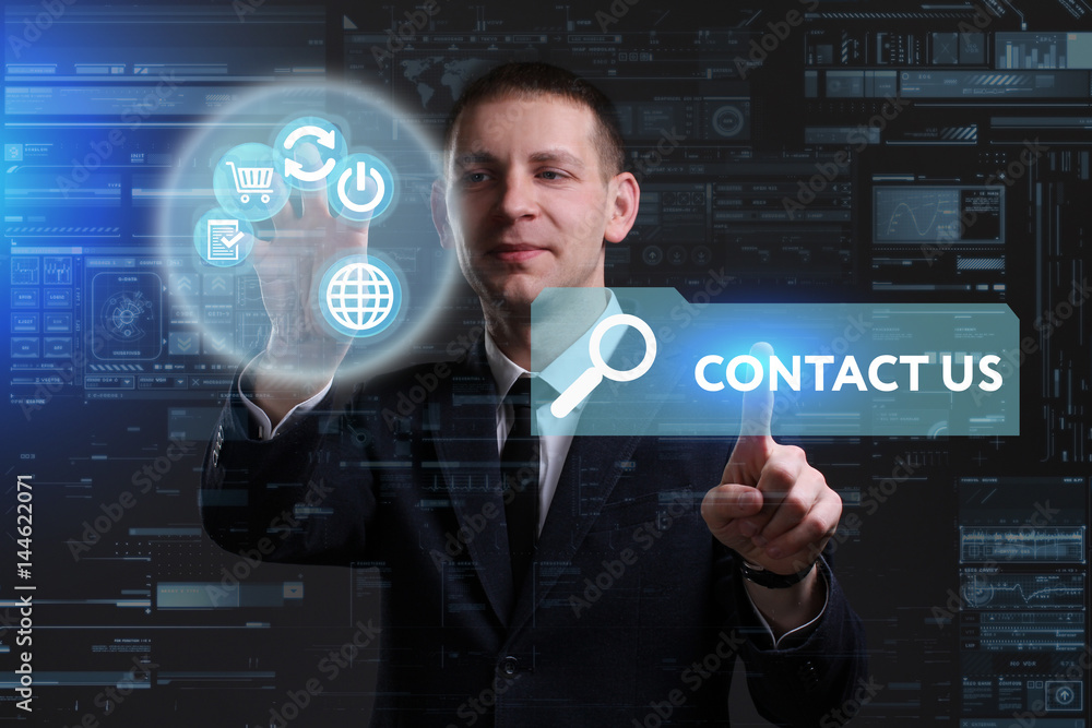 Business, Technology, Internet and network concept. Young businessman working on a virtual screen of the future and sees the inscription: Contact us Business, Technology, Internet and network concept. Young businessman working on a virtual screen of the future and sees the inscription: Contact us