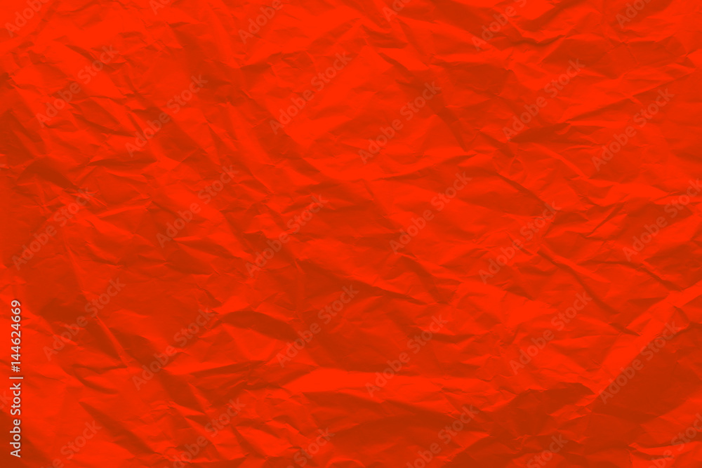 Background of crumpled red paper.