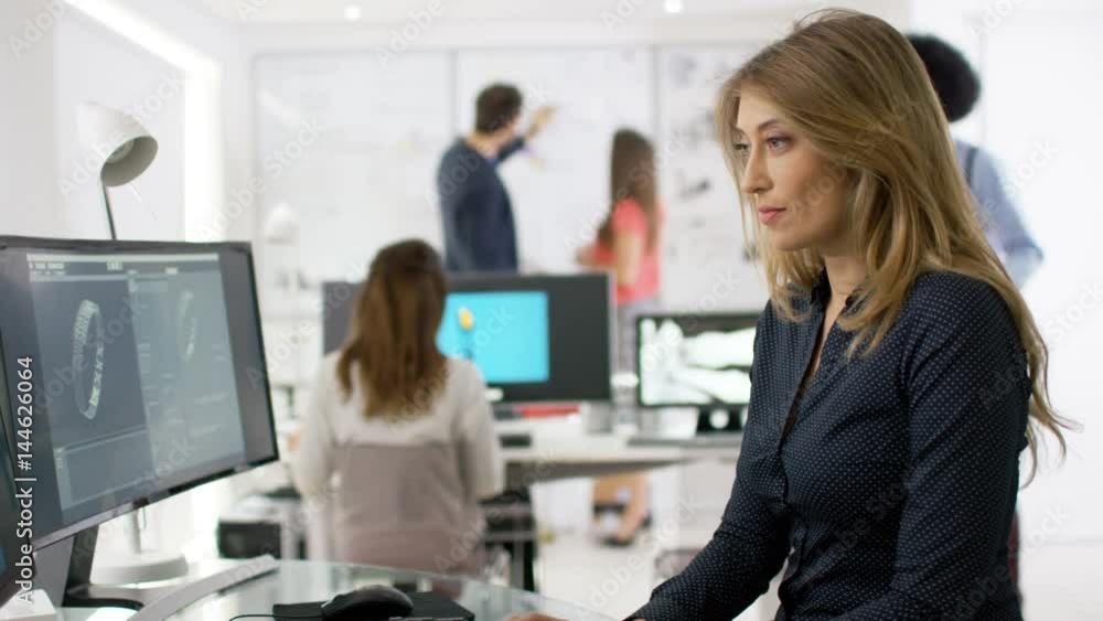 Portrait of smiling worker at technology design company Portrait of smiling worker at technology design company