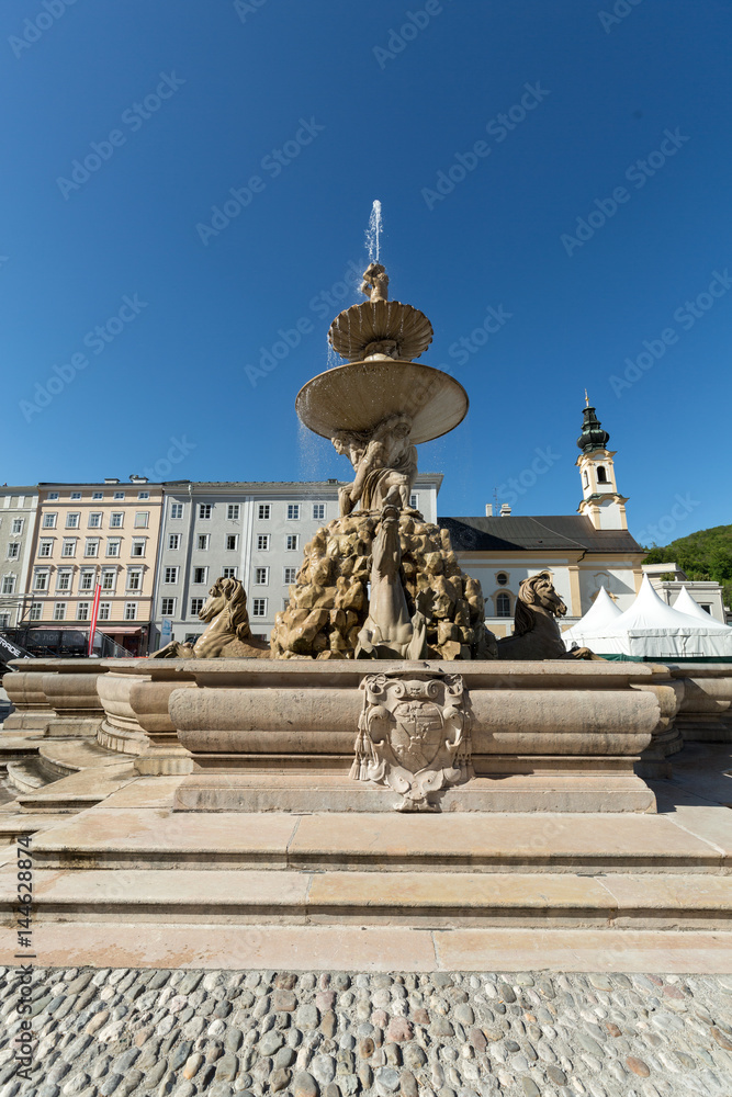 Baroque Residence fountain on Residentplatz in Salzburg. Austria