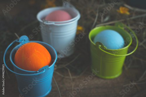 Multicolored easter eggs on a wooden. © prokop.photo
