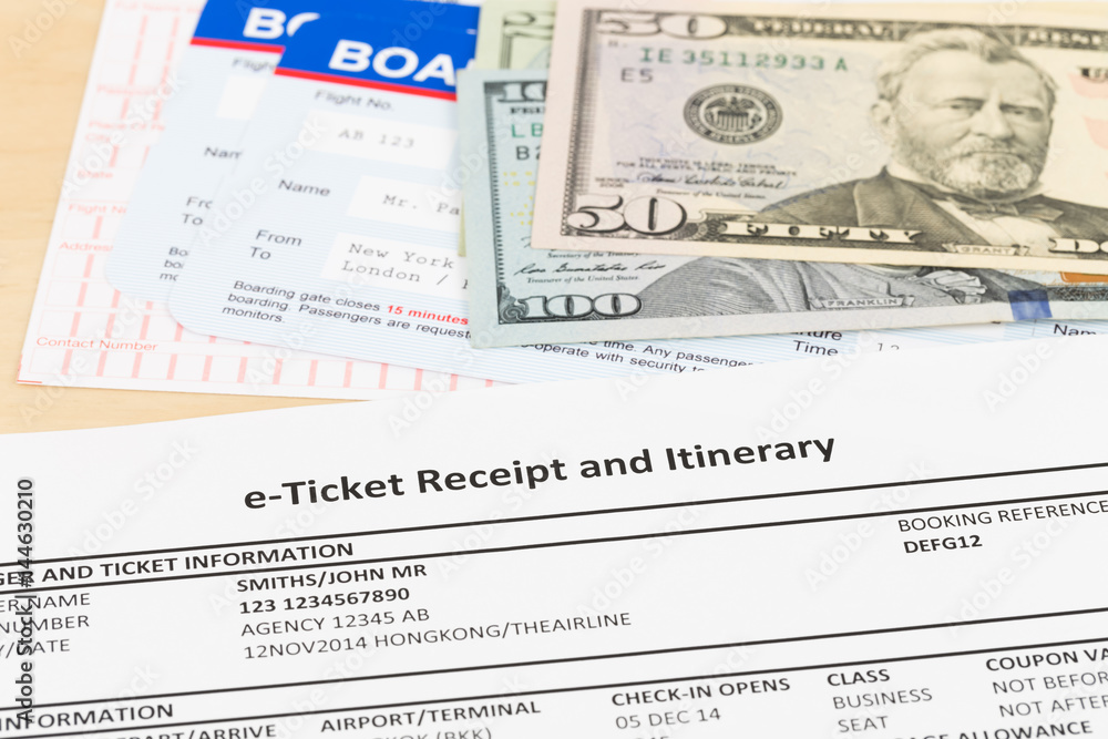 E-ticket, dollar money banknote, and boarding pass; these documents are mock-up E-ticket, dollar money banknote, and boarding pass; these documents are mock-up