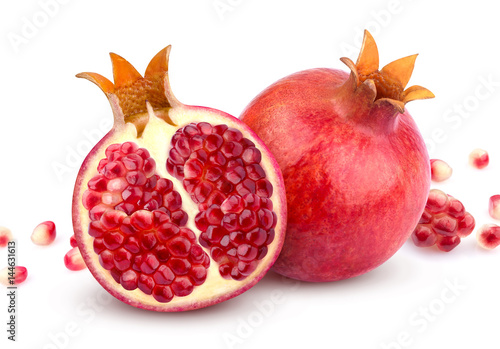 Pomegranate isolated. Whole pomegranate and its half isolated on white background