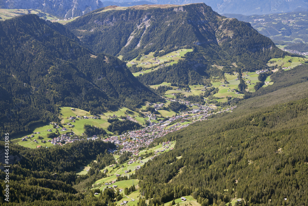 Val Gardena and Ortisei, Dolomites, view from a mountain