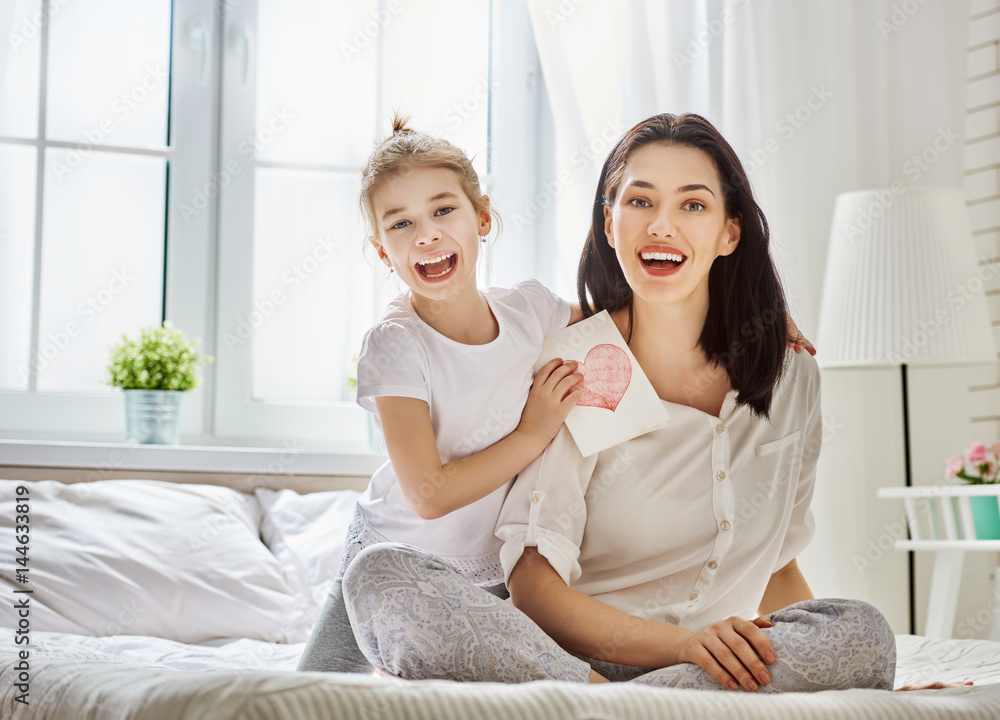 daughter congratulates mom