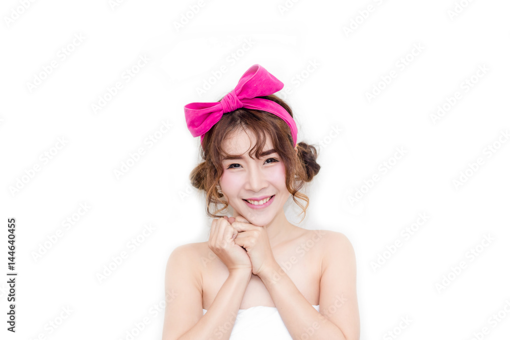 close up the beautiful woman asian look smile with pink bow on her hair close up the beautiful woman asian look smile with pink bow on her hair