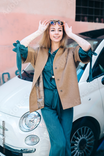 Rental car customer fyoung woman blonde hair driver
