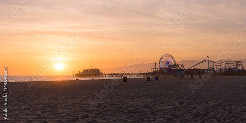 Santa Monica Pier sunset with cloud and orange sky, Los Angeles, USA © nuinthesky