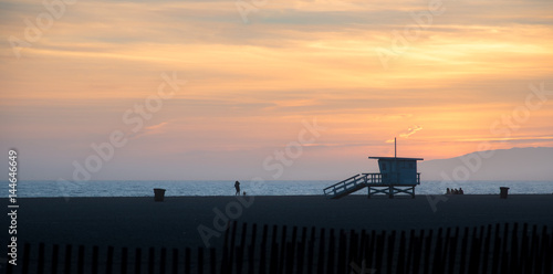 Santa Monica Pier sunset with cloud and orange sky, Los Angeles , USA.