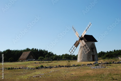 Old house and windmill on Gotland island