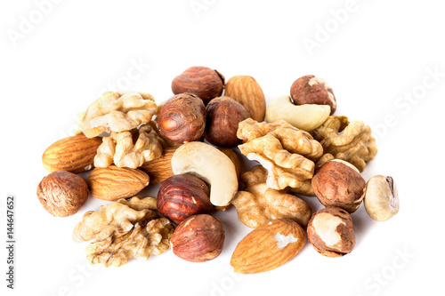 Heap from various kinds of nuts almond, walnut, hazelnut, cashew, Brazil nut isolated on white