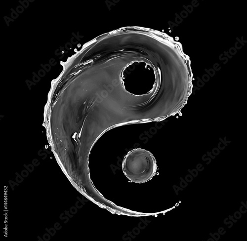 Sign of yin yang made with water splashes on black background photo