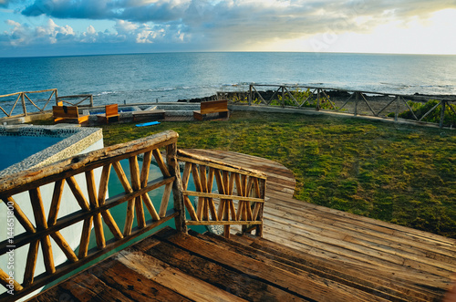 A deck with a view of the ocean