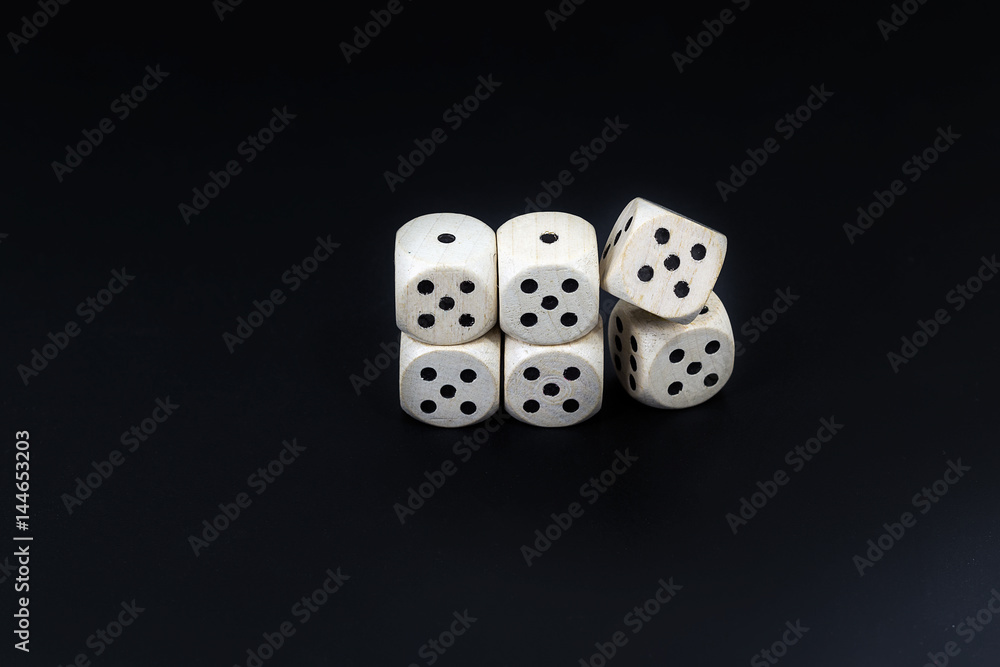Dice six fives on a black matte background Dice six fives on a black matte background