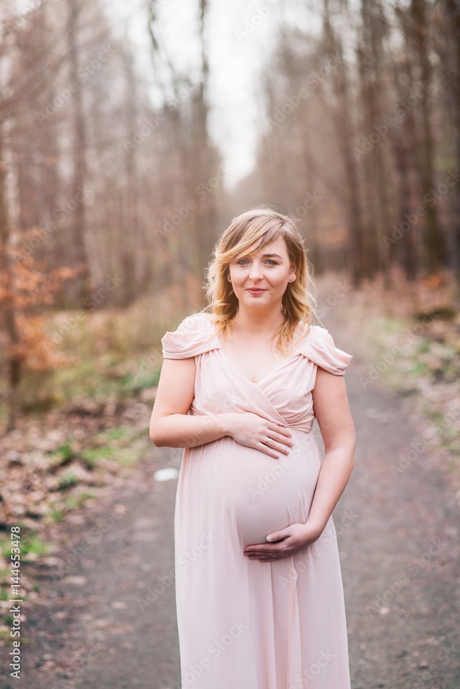 Happy pregnant woman relaxing and enjoying life