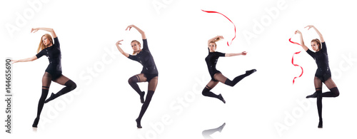 Young woman dancing on white background