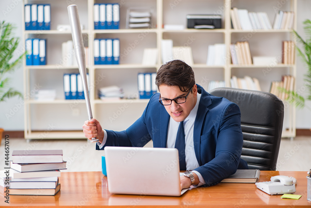 Angry aggressive businessman in the office Angry aggressive businessman in the office