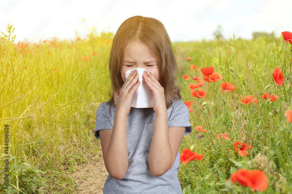 Seasonal allergy. Little girl with tissue outdoor Seasonal allergy. Little girl with tissue outdoor