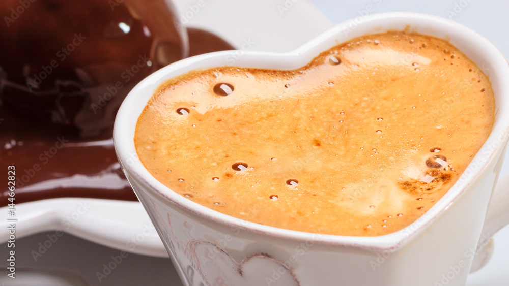 Closeup of cup of coffee and chocolate cake. Closeup of cup of coffee and chocolate cake.