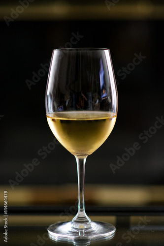 Glass of white wine chardonnay photo
