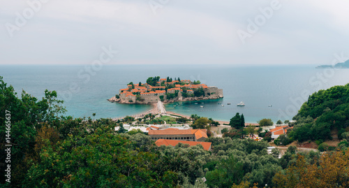 Island of Sveti Stefan, close-up of the island in the afternoon. Montenegro, the Adriatic Sea, the Balkans. © Nadtochiy