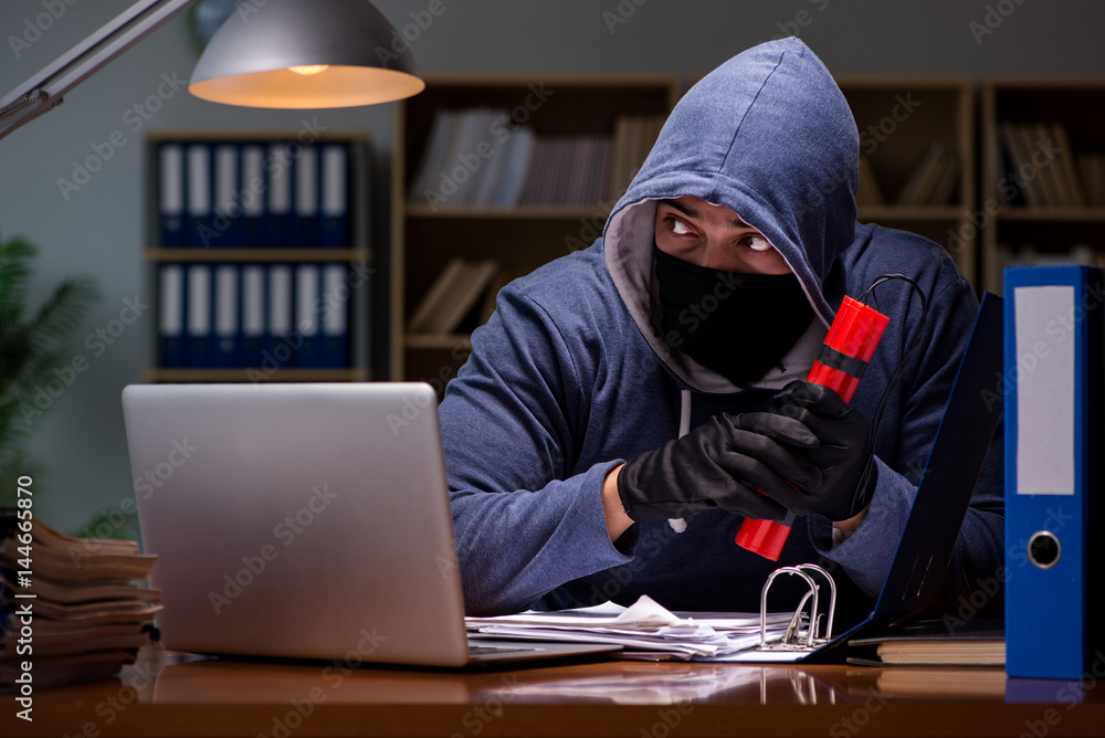 Hacker with dynamite stealing data Hacker with dynamite stealing data