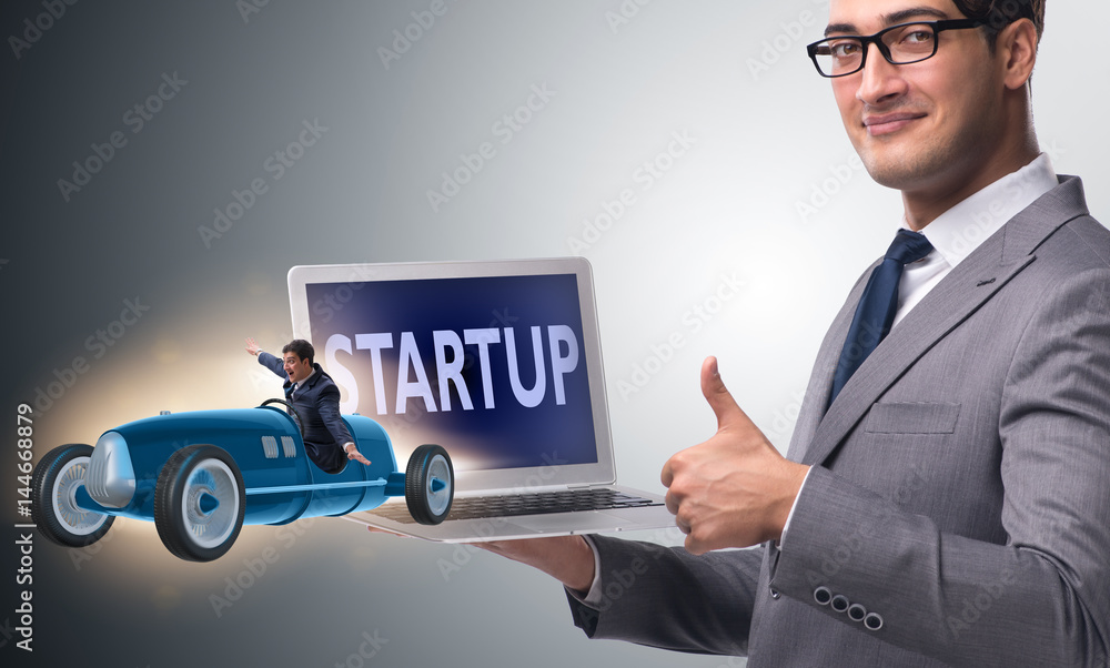 Start-up concept with businessman driving car Start-up concept with businessman driving car