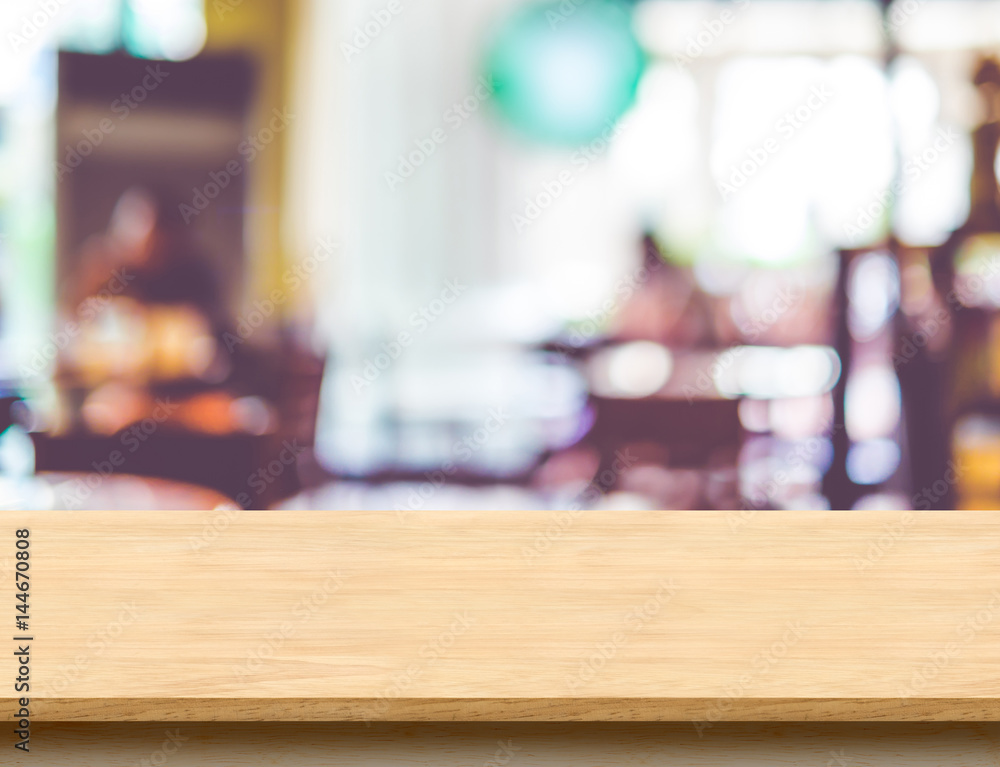 Empty wooden brown table top at blur restaurant background with bokeh light, Mock up template for display or montage of product,Food Business presentation Empty wooden brown table top at blur restaurant background with bokeh light, Mock up template for display or montage of product,Food Business presentation
