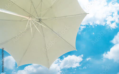 View from under a white beach umbrella