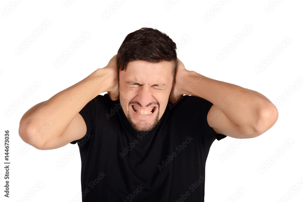 Man covering his ears. Man covering his ears.