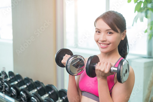 sport woman with dumbbell