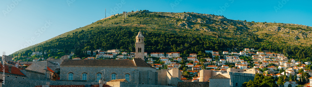 Dubrovnik Old Town, Croatia. Tiled roofs of houses. Church in the city. City View from the wall.
