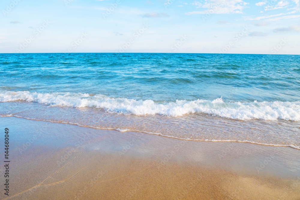 Soft wave on the sandy beach of tropical sea Soft wave on the sandy beach of tropical sea