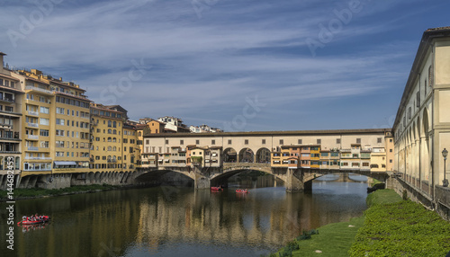 The famous and beautiful Ponte Vecchio bridge over the Arno river, historic center of Florence, Italy