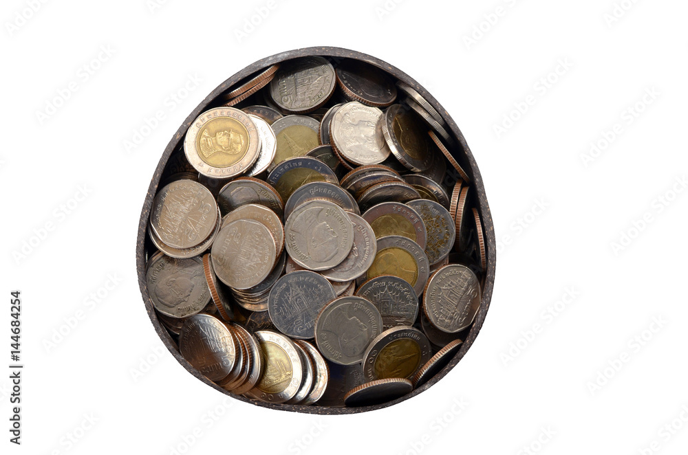 Thai coin in coconut shell on white background Thai coin in coconut shell on white background