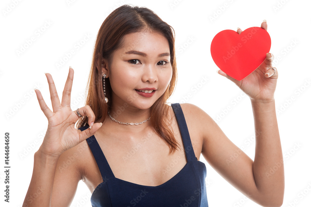 Asian woman show OK with red heart. Asian woman show OK with red heart.